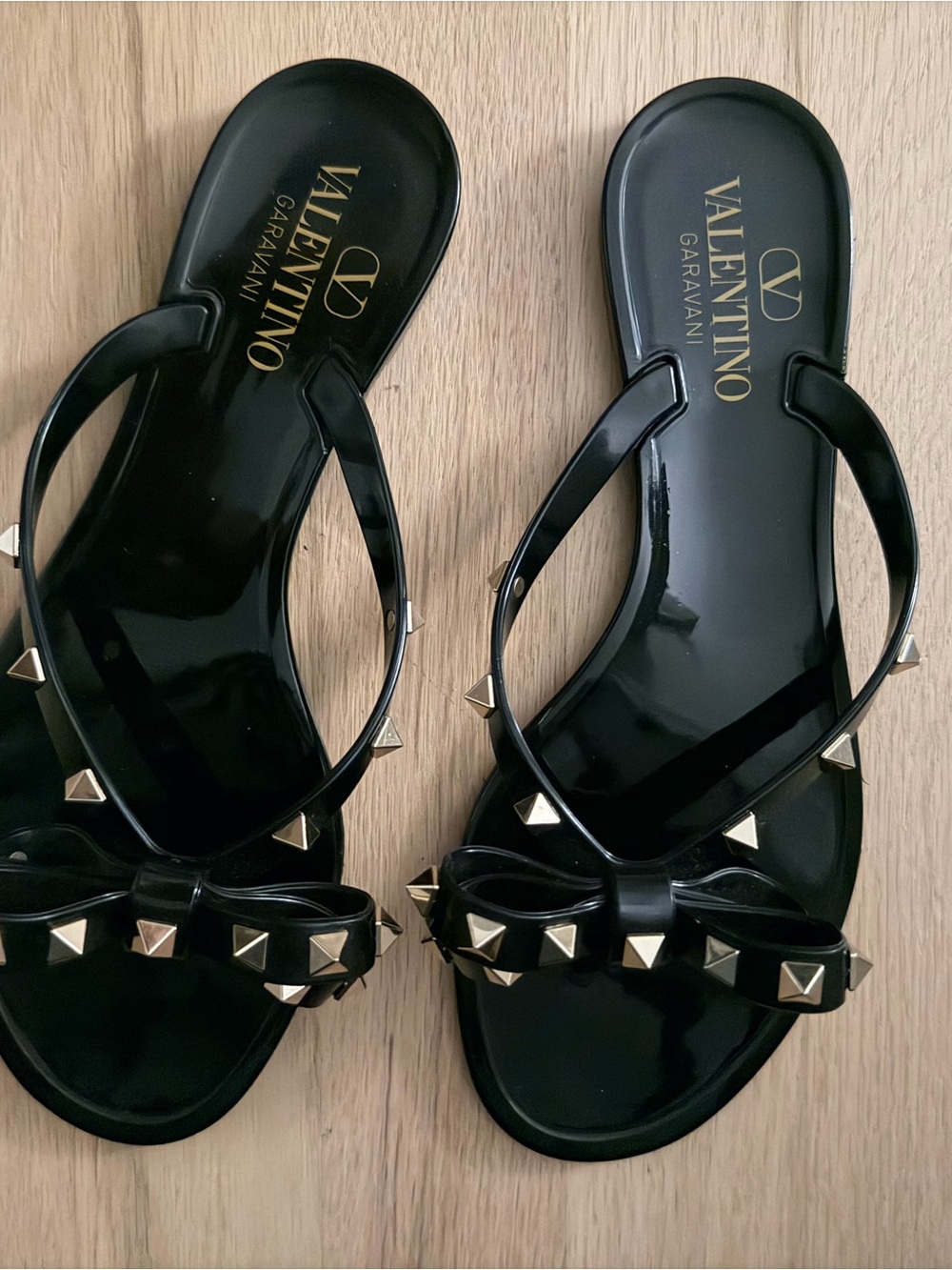 Valentino Garavani Black Rockstud Bow Jelly Flip Sandals
